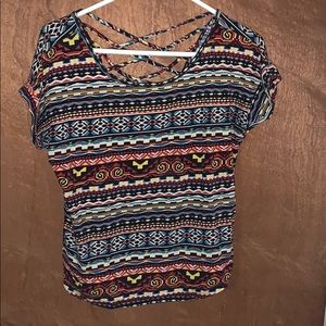 Cute top with cross cross detailing on back!